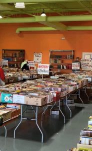 Used books for sale, arranged on tables